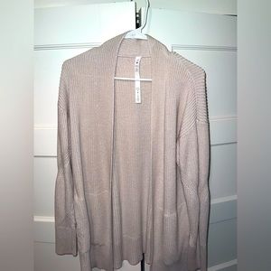 Cream Cardigan from Lululemon. Size M/L